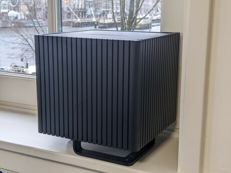 black cube computer with extruded aluminum heatsinks for the sides