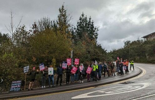 Picket line on Penryn campus - determined people with placards about working conditions, real time pay cuts and unfair cuts to pensions