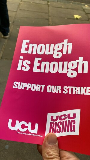 university and college union stike flyer reading “enough is enough”