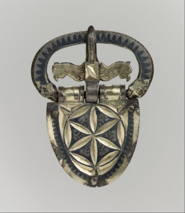 Belt buckle: c.a. 400ad This object comes from the Vermand Treasure, the most richly appointed barbarian-warrior grave ever found. The grave was likely that of an auxiliary soldier stationed in the Roman province of Gaul.  silver