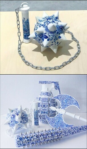 Art. 2 Pics of Sculptures made of porcelain. A Morning star with iron Ball.
A set of custom made sculptures hand painted in the delft blue style of ceramics. 
The Artist:
"It's an approach to represent the inner strength and fury that comes with being a woman, in contrast to an appearance of delicacy we're too often branded with."