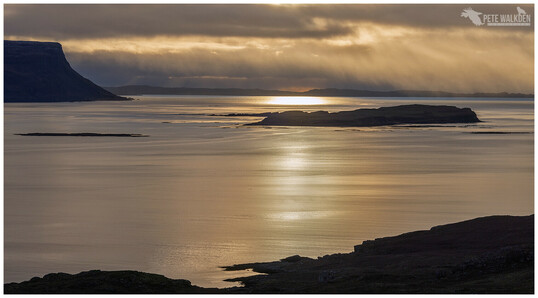 A view late afternoon from the northern shore of Loch Na Keal, looking over the small island of Inch Kenneth, towards Iona, on the horizon. As seen from Mull, on New Year's Day.