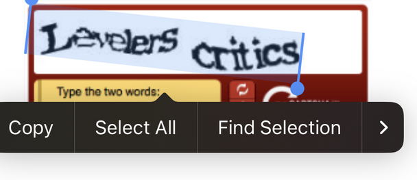 Old-style captcha bot protection (wavy text) with text selected using iPhone’s build-in CTR.