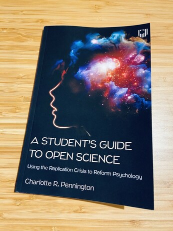 Photo shows the front cover of Dr Charlotte Pennington’s new book “A Student’s Guide to Open Science”