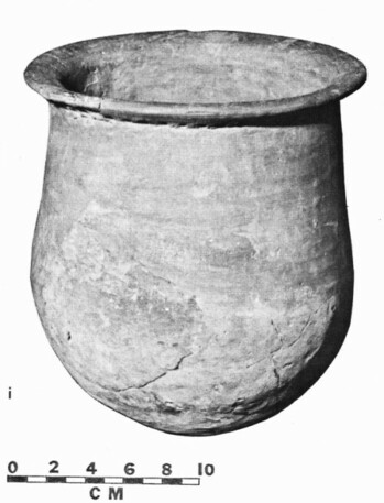 ~16.7 tall by 17.8 wide (at rim & 1/3 up on body) jar with convex base & body that slightly taper to about 15 cm diameter right before the rim. The rim with rounded lip flares out about 1.5 cm & is nearly flat (horizontal) Along the rim-body juncture are a series of finger-pinched "punctations". There are visible horizontal lines on parts of the body indicating coil marks.