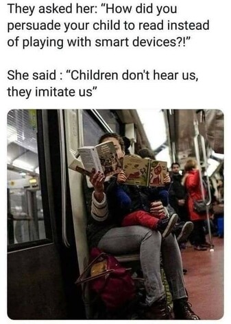 Lady reading on subway. Children imitate us.