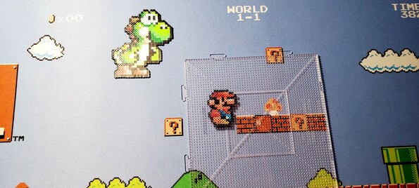 Yoshi and Mario bead characters made by hand.