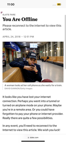 A Slate page overlay that lets me know I can’t read the article because I’m offline