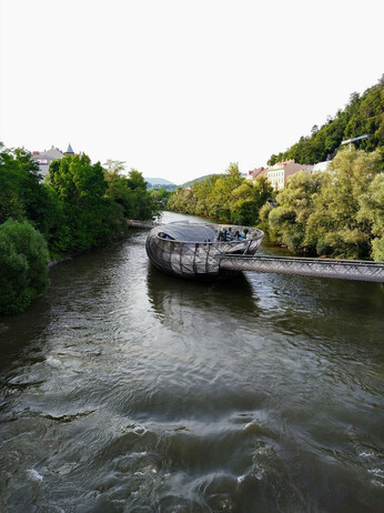 Photo of the Mur river and the Murinsel in Graz.