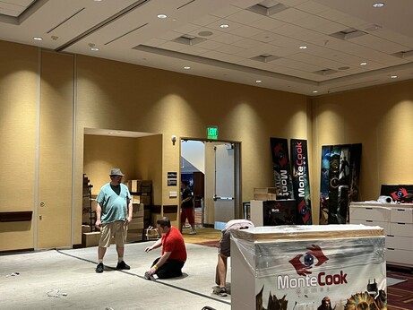 The Monte Cook Games Room 132 being built at Gen Con, 2023