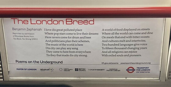 Poem by Benjamin Zephaniah entitled The London Breed. Photo is of an ad banner above the seats in a London underground train.