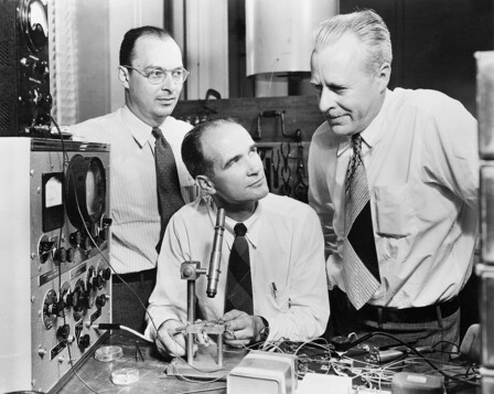 John Bardeen, William Shockley, and Walter Brattain at Bell Labs in 1948; Bardeen and Brattain invented the point-contact transistor in 1947 and Shockley invented the bipolar junction transistor in 1948.

Photo of (from left) John Bardeen, William Shockley and Walter Brattain, the inventors of the transistor, 1948. This is one of a series of publicity photos produced by Bell Labs around the time of the public announcement of the invention (June 30, 1948). Although Shockley was not involved in the invention, and has never been listed on patent applications, Bell Labs decided that Shockley must appear on all publicity photos along with Bardeen and Brattain.