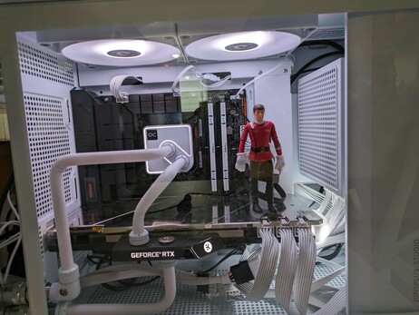 a toy spock inside a PC case built to resemble the warp core in which he dies