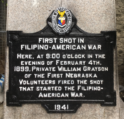Photo of the historical marker created by the Philippines Historical Committee to commemorate the start of the Philippine–American War with the following inscription:

First Shot in Filipino–American War

Here, at 9:00 o’clock in the evening of February 4th, 1899, Private William Grayson of the First Nebraska Volunteers fired the shot that started the Filipino–American War.