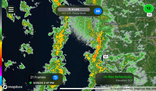 A radar image of a line of storms along the coast with another about 50 km offshore and showers behind it.