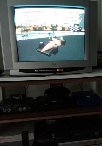 A CRT TV showing World Tour Racing on the Atari Jaguar running on the Game Drive SD card