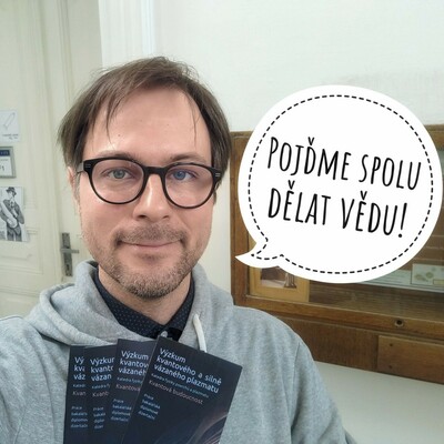 Michal Hejduk handing over leaflets about bachelor projects.
