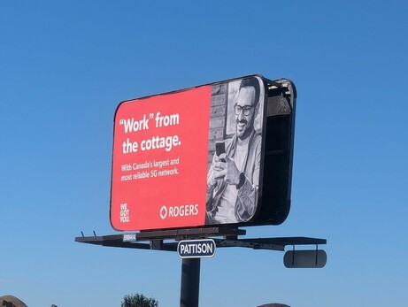 A billboard from Rogers that says: "'Work' from the cottage."