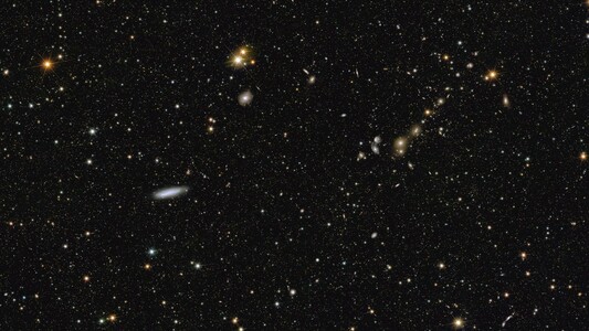 This image shows an area of the mosaic released by ESA’s Euclid space telescope on 15 October 2024. The area is zoomed in twelve times compared to the large mosaic. In the middle left, spiral galaxy NGC 2188 is visible edge-on at a distance of 25 million light-years. In the top right corner, galaxy cluster Abell 3381 is now clearly noticeable, 678 million light-years away from us.