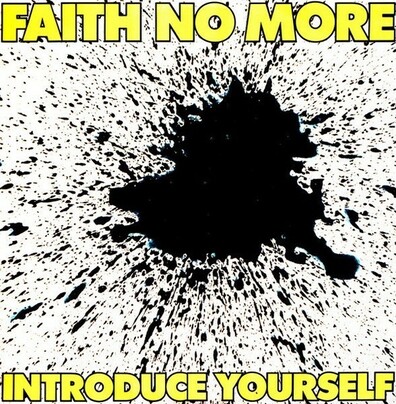 Picture of an album cover which has a large black ink blot on white background. Name of the band on top and name of the album on the bottom, both with yellow blocky font
