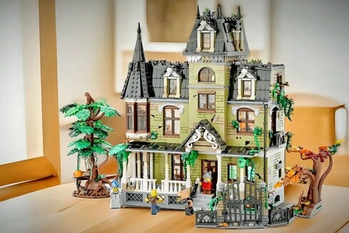 A model of a two-story house made of Lego bricks