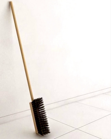 A broom where the part you sweep with is on top instead of on the side, making it impossible to sweep with.