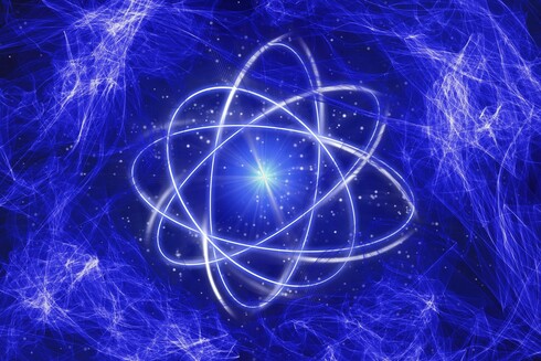 image of an atom with waves