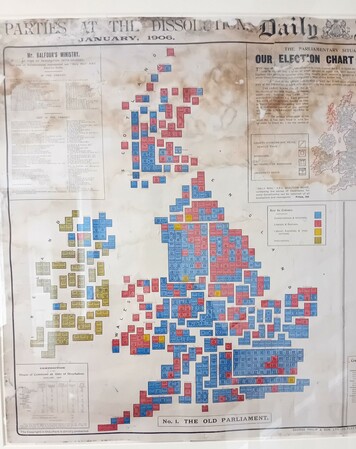 A cartogram of the composition of the parliament of the United Kingdom of Great Britain and Ireland prior to the 1906 General Election ("the administration of Mr Balfour").

Each constituency is shown as a square of constant size roughly located in a geographically accurate position so that the end result is a recognisable map of Britain and Ireland.. Squares are coloured according to political party (e.g., blue for Conservative, red, apparently, for the Liberals).

Great Britain is predominantly blue hued, as is what is now Northern Ireland. Most of Ireland returned Irish Nationalosts, shown with a greenish colour.