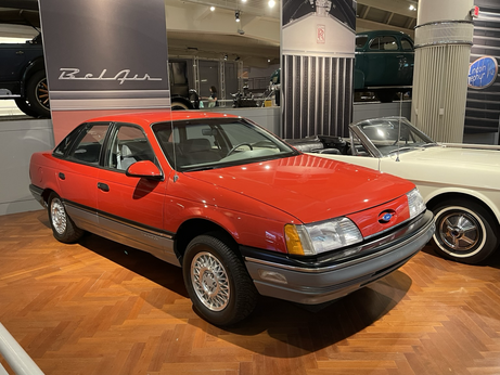 This is the Ford Taurus, it’s in shiny red