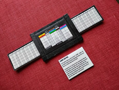 A slide rule made specifically for the board game Acquire. Calculates the cash-out price of the three different tiers of properties based on the number of shares and hotels.