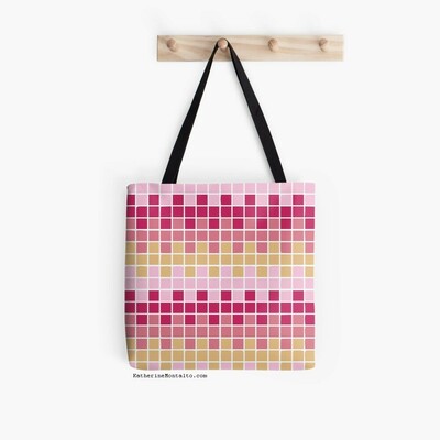 Abstract grid of multi-color squares printed on a tote bag