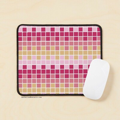 Abstract grid of multi-color squares printed on a mouse pad