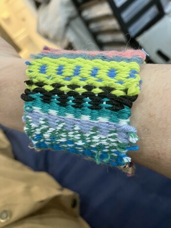 the piece being worn as a bracelet