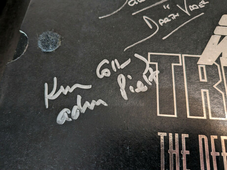 A close up of Kenneth Colley's signature on the laserdisc box set.
