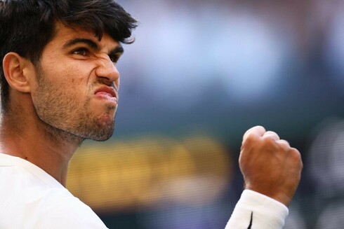 Carlos Alcaraz celebrates his win over Jan-Lennard Struff at Wimbledon