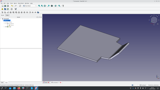 A small object in the FreeCAD preview window that looks like a chassis made from a flat metal sheet with an angled bumper section coming from one end of it at around 45 degrees.