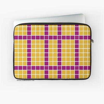Abstract grid of multi-color squares printed on a lap top sleeve