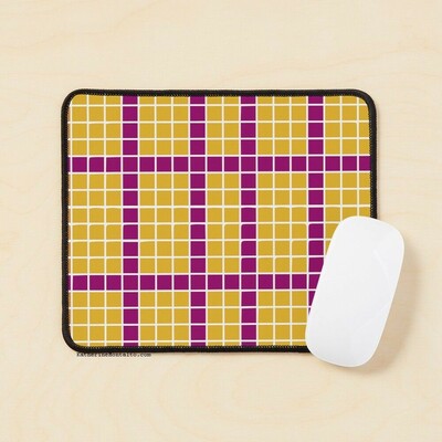 Abstract grid of multi-color squares printed on a mouse pad