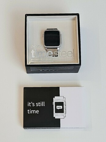 a new-in-boz Pebble Time Steel and brand new Core 2 Duo