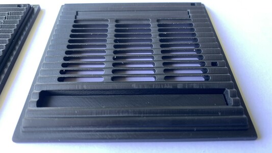 Resin print of the NeXTcube front grill from another angle