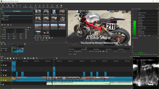 🕶️ A view of its user interface in a dark theme, with top left (1/4 of the screen), the area for files to be processed (images, films), right (1/4 of the screen), film rendering with a timeline and player (play, forward, backward, ...), and bottom (half the screen), the timeline of edits with the various sources.

📚️ Shotcut is a libre, multi-platform, non-linear video editor. It supports a wide range of audio, video and images formats via FFmpeg and Frei0r, has many features for audio (volume, balance, filters, spectrum analyzer, effects, 5.1 sound, Jack, ...), video (transitions , composition, mixing, filters, effects) and editing (copy, cut, paste, insert, erase, timeline, undo / redo, save and load, drag-n-drop from the file manager, ...), capture from webcam, screen, audio or network, and supports different professional devices.