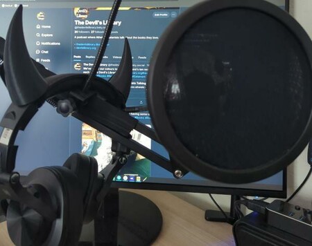 Pic of Leraje's headphones (complete with Devil horns) and mic ready for tonight’s episode recording