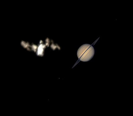 Image of Saturn and blur of ISS in one frame.