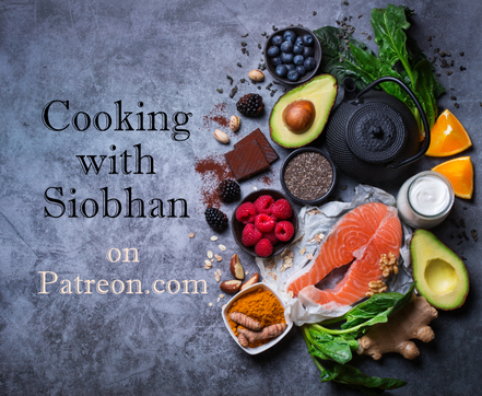 Cooking with Siobhan on Patreon.com
Various foods arranged around a black cast iron teapot against a gray surface