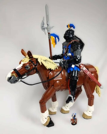 a model of a knight on horseback made of Lego bricks
