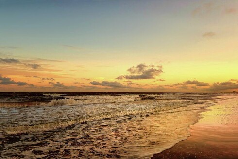 Golden sunset over Myrtle Beach, South Carolina with soft waves and coastal reflection – beach photography print. From the Fine Art Gallery of Shelia Hunt.