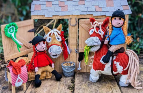 Photo of crocheted figures, caption reads ‘Pictures like this of crochet by Bea King, who trades as cottontail&whiskers Ltd, have been pinched to promote a dubious app’
