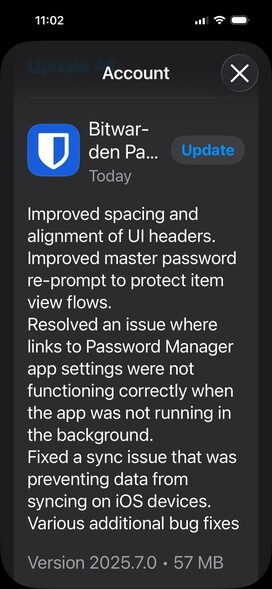 An update screen for the Bitwarden password manager app detailing improvements, bug fixes, and updates related to user interface elements and syncing issues on iOS devices.