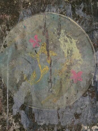 Very grungy print on waste paper of a hastily doodled flower.
