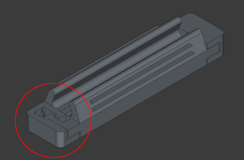 The top layer of the left mechanism has been removed to provide a look inside. There is a print-in-place springy part that holds the two parts together while allowing them to move towards each other.
